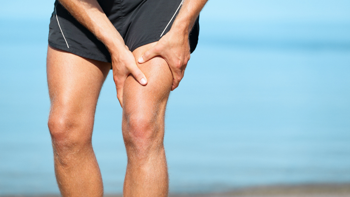 Man suffering from cramp Leg cramp