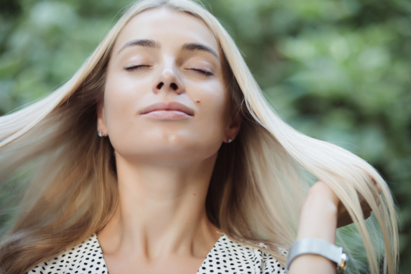 Woman taking spirulina for her hair