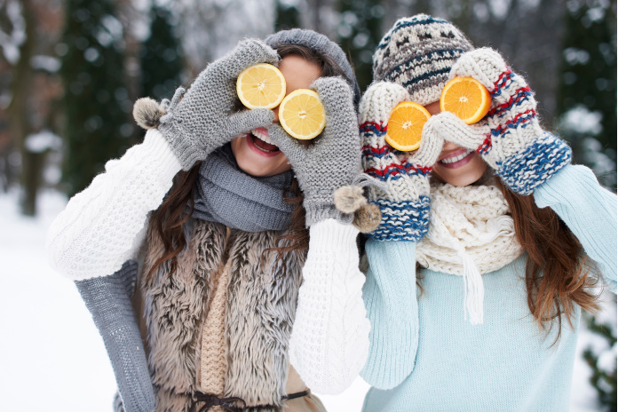 Women taking supplements in winter