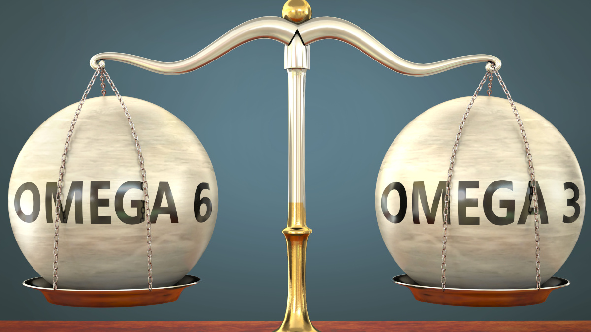 Omega-3 and omega-6 on a set of scales Balance between omega-3 and omega-6